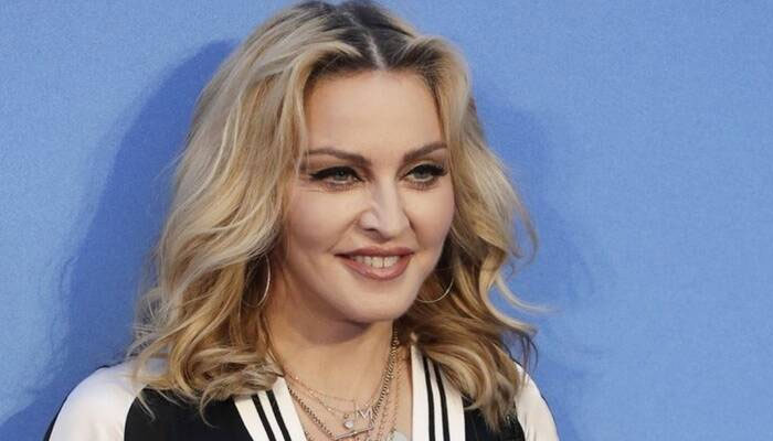 Madonna irks fans as she photoshops herself into daughters snap