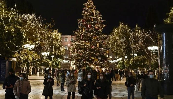 Greece has mandated people to wear face masks both indoors and outside during Christmas and New Years gatherings. AFP