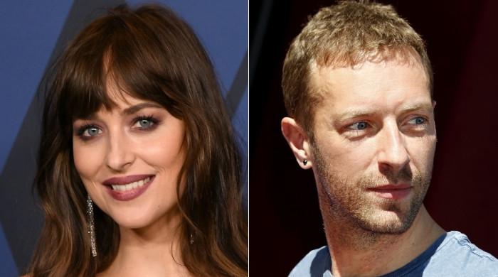 Dakota Johnson lifts the lid on her private relationship with Chris Martin