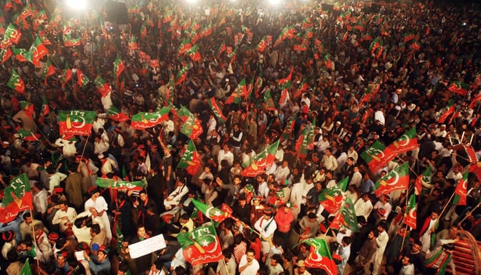 PTI activists seen at Parade Ground during party gathering in 2016. — Online/File