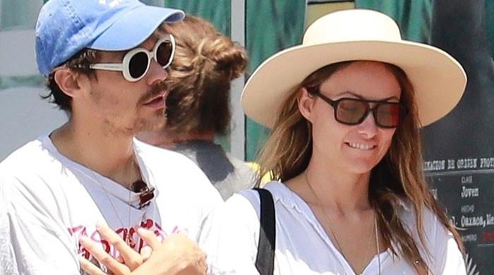 Harry Styles Smiles in Eternals Photos, Olivia Wilde Obviously Watching