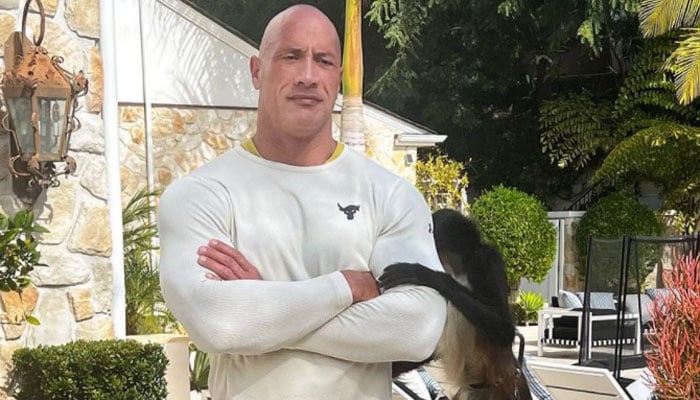 Dwayne Johnson talks saving animals while cradling Macho the monkey ‘like my children’