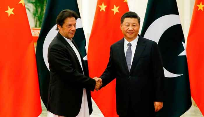 Prime Minister Imran Khan meets Chinese President Xi Jinping. -File photo/APP