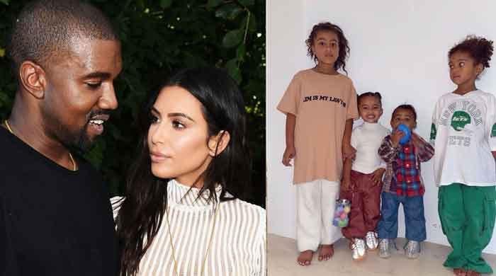 Kanye West says Kim Kardashian put security on him while he played with son