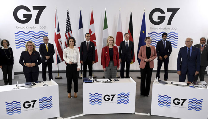 G7 Foreign and Development Ministers pose for a group photo on December 12, 2021. Photo: AFP