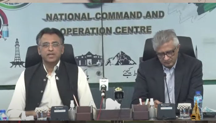 Federal Minister for Planning and Development Asad Umar (L) and Special Assistant to the Prime Minister (SAPM) on Health Dr Faisal Sultan addressing a press conference after the NCOC meeting. — YouTube screengrab