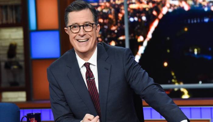 The Late Show’s makers suspends taping new episodes as Stephen Colbert shows signs of COVID