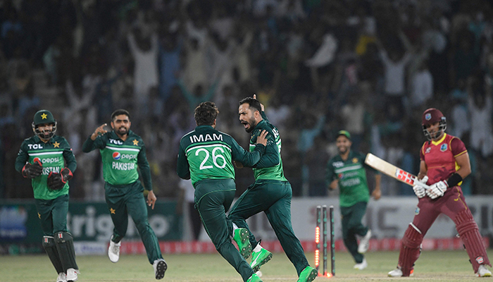 Pakistan´s Mohammad Nawaz (C) celebrates with teammates after taking the wicket of West Indies´ Brandon King (R) during the second one-day international (ODI) cricket match between Pakistan and West Indies at the Multan Cricket Stadium in Multan on June 10, 2022. — AFP