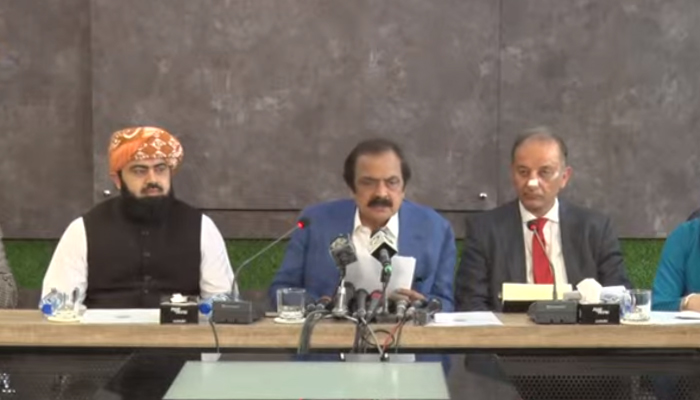 Interior Minister Rana Sanullah (centre) addresses a press briefing alongside other federal ministers in Islamabad, on June 14, 2022. — YouTube/PTV