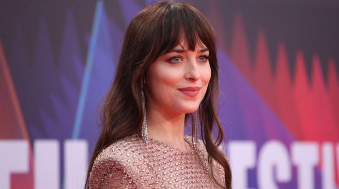 Dakota Johnson says ‘it’s pretty cool’ to be in the Marvel universe