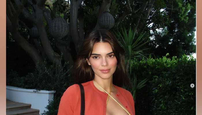 Kendall Jenner shares eye-popping snaps in yellow string tiny top to show off her killer curves