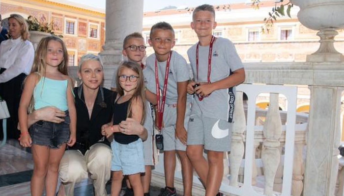 Princess Charlene makes surprise visit to Monaco Palace, hugs tourists