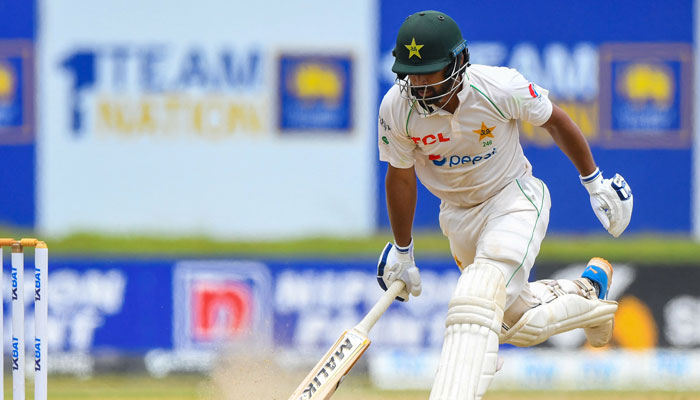 Pakistan’s Abdullah Shafique runs between wickets during the final day of play of the first cricket Test match between Sri Lanka and Pakistan at the Galle International Cricket Stadium in Galle on July 20. Photo: AFP