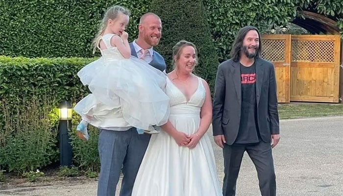 Keanu Reeves surprises British couple as he crashes their nuptials