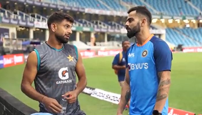 Pakistans Haris Rauf (L) and Indian batter Virat Kohli. — Twitter/@BCCI/File