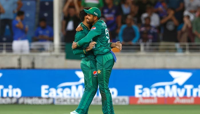 Babar Azam and Naseem Shah hug each other during the match. — PCB/Twitter