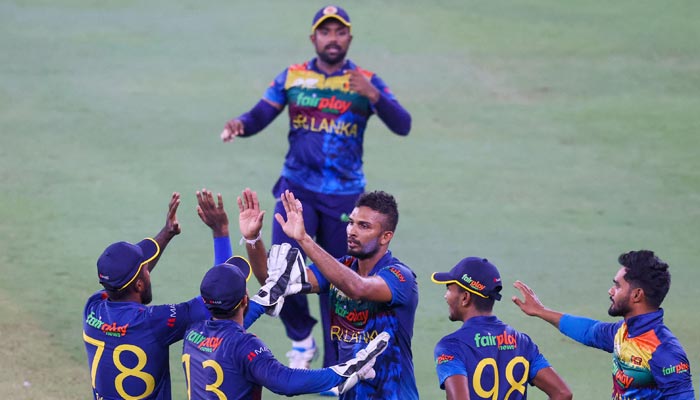 Sri Lanka´s players celebrate after dismissing India´s Hardik Pandya (not pictured) during the Asia Cup Twenty20 international cricket Super Four match between India and Sri Lanka at the Dubai International Cricket Stadium in Dubai on September 6, 2022. — AFP/File