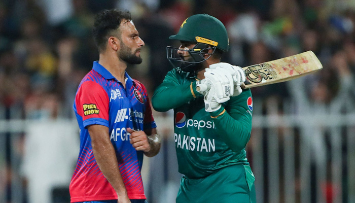 Asif Ali (R) and Fareed Ahmad argue after a dismissal during the Asia Cup Twenty20 international cricket Super Four match between Afghanistan and Pakistan at the Sharjah Cricket Stadium in Sharjah on September 7, 2022. -AFP