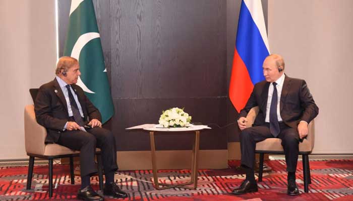 Prime Minister Shahbaz Sharif (L) and Russian President Vladimir Putin (R) meet in Samarkand on the sidelines of the Shanghai Cooperation Organisation (SCO) summit. — Radio Pakistan
