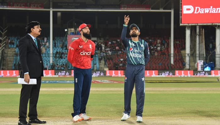 English captain Moeen Ali and Babar Azam photographed during the toss. — PCB/@TheRealPCB