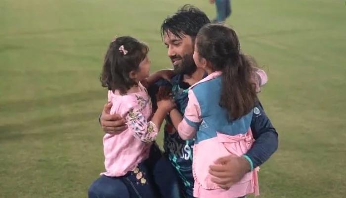 Mohammad Rizwan with his daughters on the field. — Screenshot/Twitter/File