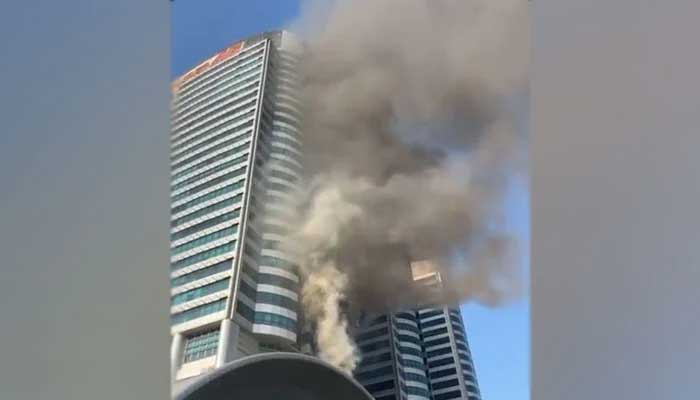 Image showing clouds of smoking emitting out of the shopping malls building. — Screengrab via YouTube/ Geo News Live