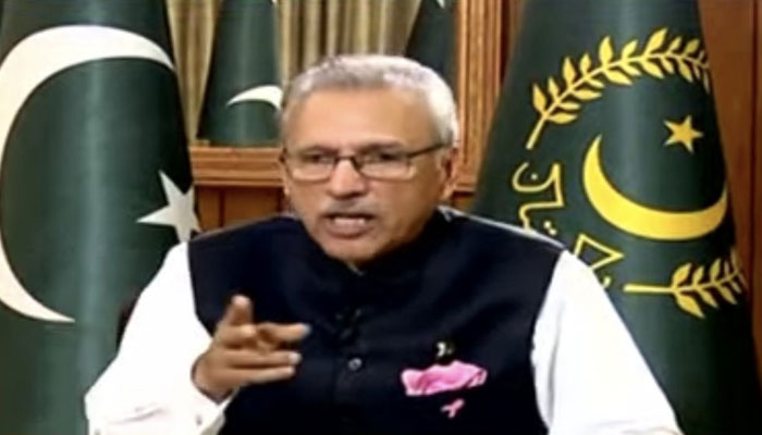 President Arif Alvi speaking to a private news channel in an exclusive interview on October 12, 2022. Screengrab of a Twitter video.