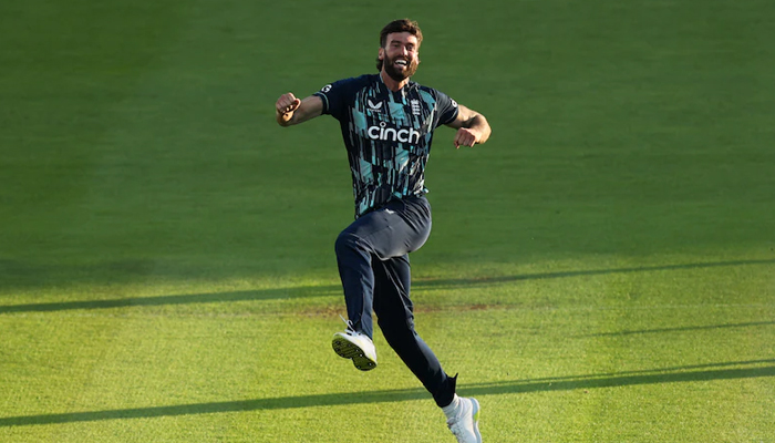 England bowler Reece Topley jumps during a match in this undated photo. — AFP/File