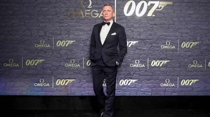 Daniel Craig looks dapper at James Bond’s 60th anniversary celebrations