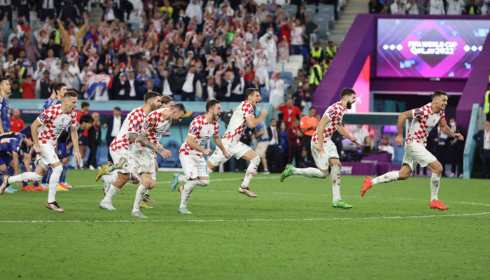 Croatia’s players celebrate winning the Qatar 2022 World Cup round of 16 football match between Japan and Croatia at the Al-Janoub Stadium in Al-Wakrah, south of Doha on December 5, 2022. — AFP