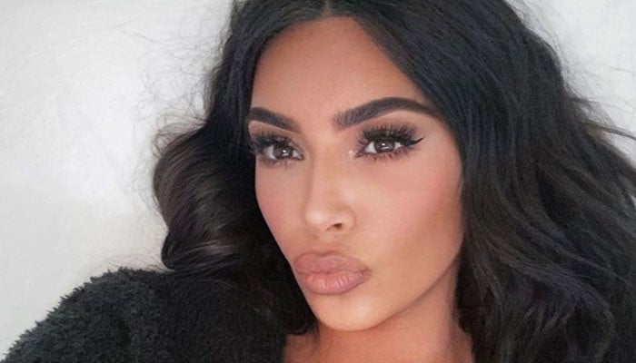 Kim Kardashian told to 'please change' her pose over 'duck face' selfies