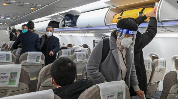 China Ends Quarantine For Overseas Travellers