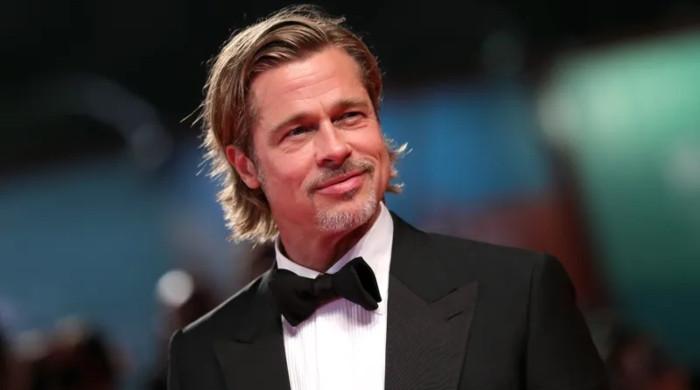 Brad Pitt Reminisces On His First Onscreen Love Scene in 'Dallas