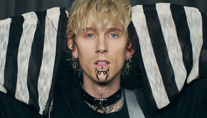 Machine Gun Kelly claps back at people posting mean comments on his style