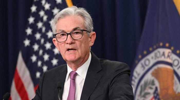 US Fed unveils smaller rate hike but signals inflation fight not over