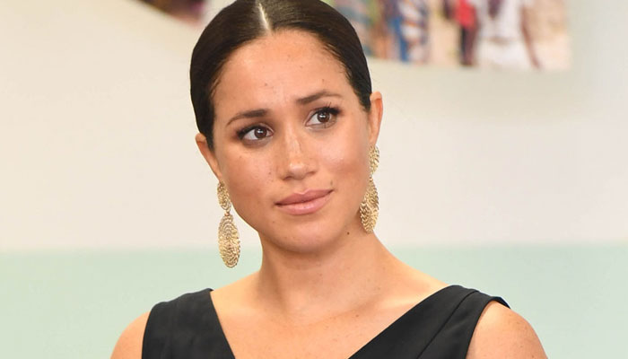 Meghan Markle was asked to flash smile as paps chased her in Canada