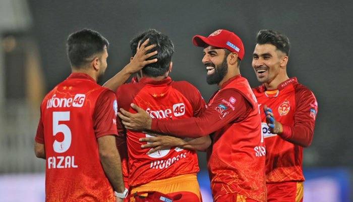 Islamabad United players celebrate during the 21st match of the Pakistan Super League in Pindi Cricket Stadium in Rawalpindi on March 5, 2023. — PSL