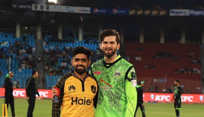 Peshawar Zalmi Captain Babar Azam (left) and Lahore Qalandars Captain Shaheen Afridi before the second eliminator of the Pakistan Super League (PSL) at the Gaddafi Stadium in Lahore on March 17, 2023. — PSL