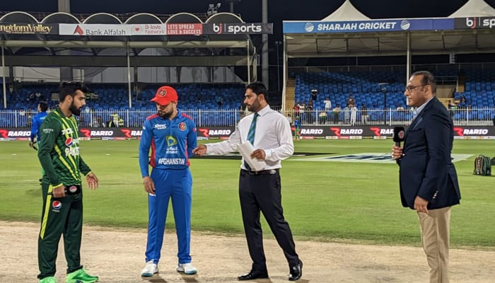 Pakistan captain Shadab Khan and Afghanistan skipper Rashid Khan at toss. — Twitter@TheRealPCB