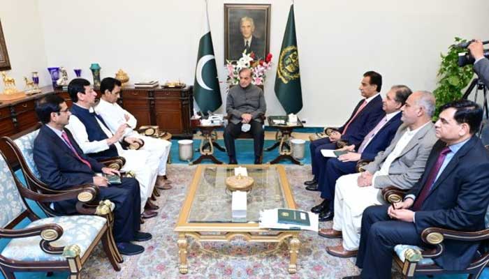 Prime Minister Shehbaz Sharif meets the MQM-Pakistan delegation at the PM House in Islamabad on March 29, 2023. — APP