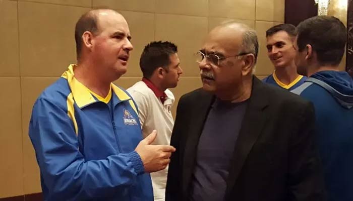 Mickey Arthur (left) in conversation with Najam Sethi. — PSL/File