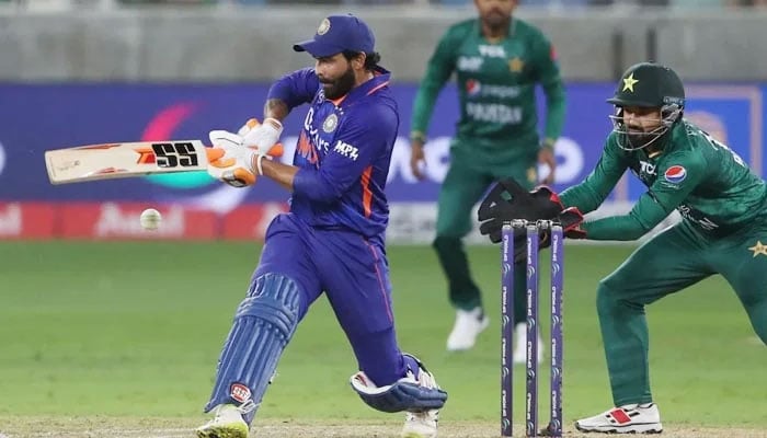 Ravindra Jadeja goes for a pull shot during the Asia Cup Twenty20 international cricket Group A match between India and Pakistan at the Dubai International Cricket Stadium in Dubai on August 28, 2022. — AFP