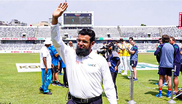 Aleem Dar waves after receiving guard of honour after officiating in his last Test match as an ICC Elite Panel umpire in Dhaka on April 7, 2023. — Twitter/@ESPNcricinfo