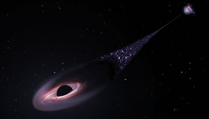An artists impression of a runaway supermassive black hole that was ejected from its host galaxy. — NASA