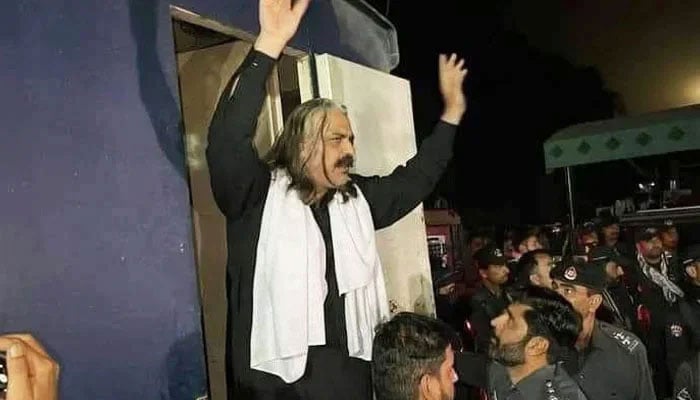 Police take Ali Amin Gandapur into custody in Dera Ismail Khan on March 6, 2023. — Twitter/@Jhagra