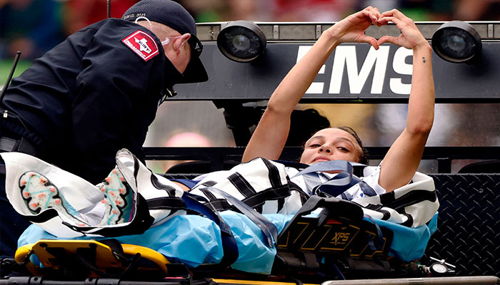 Mallory Swanson of the United States gestures toward fans after being injured against the Republic of Ireland during the first half of a 2023 International Friendly match at Q2 Stadium on April 8, 2023 in Austin, Texas. AFP