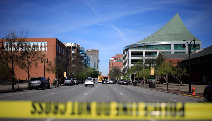 Crime scene taped off after a fatal mass shooting in a bank building in Louisville, Kentucky, on April 10, 2023. — AFP