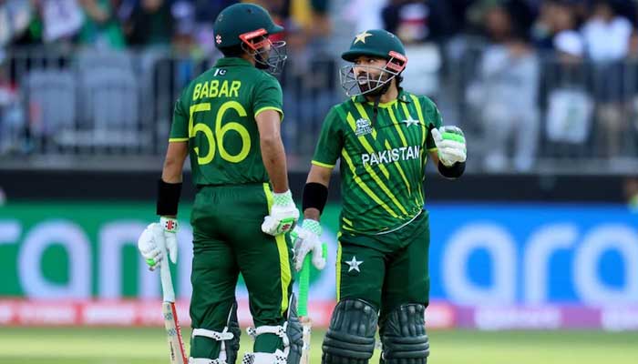 Pakistans opening pair Babar Azam (right) and Mohammad Rizwan bump fists during a match against New Zealand in Lahore, on April 15, 2023. — Twitter/@TheRealPCB