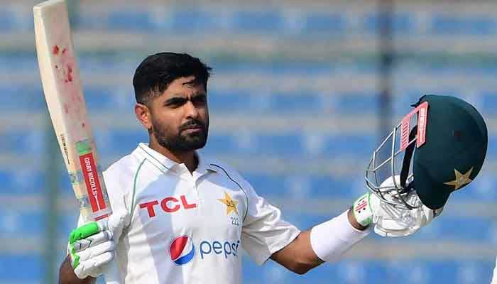 Pakistans captain Babar Azam gestures after scoring a century during the first day of the first cricket Test match between Pakistan and New Zealand at the National Stadium in Karachi on December 26, 2022.— AFP/File