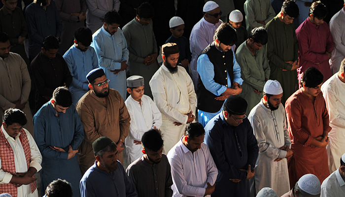 Believers during Eid ul Fitr prayers at Masjid-e-Khizra in Karachis Saddar area, on April 22, 2023. — Hassaan Ahmed